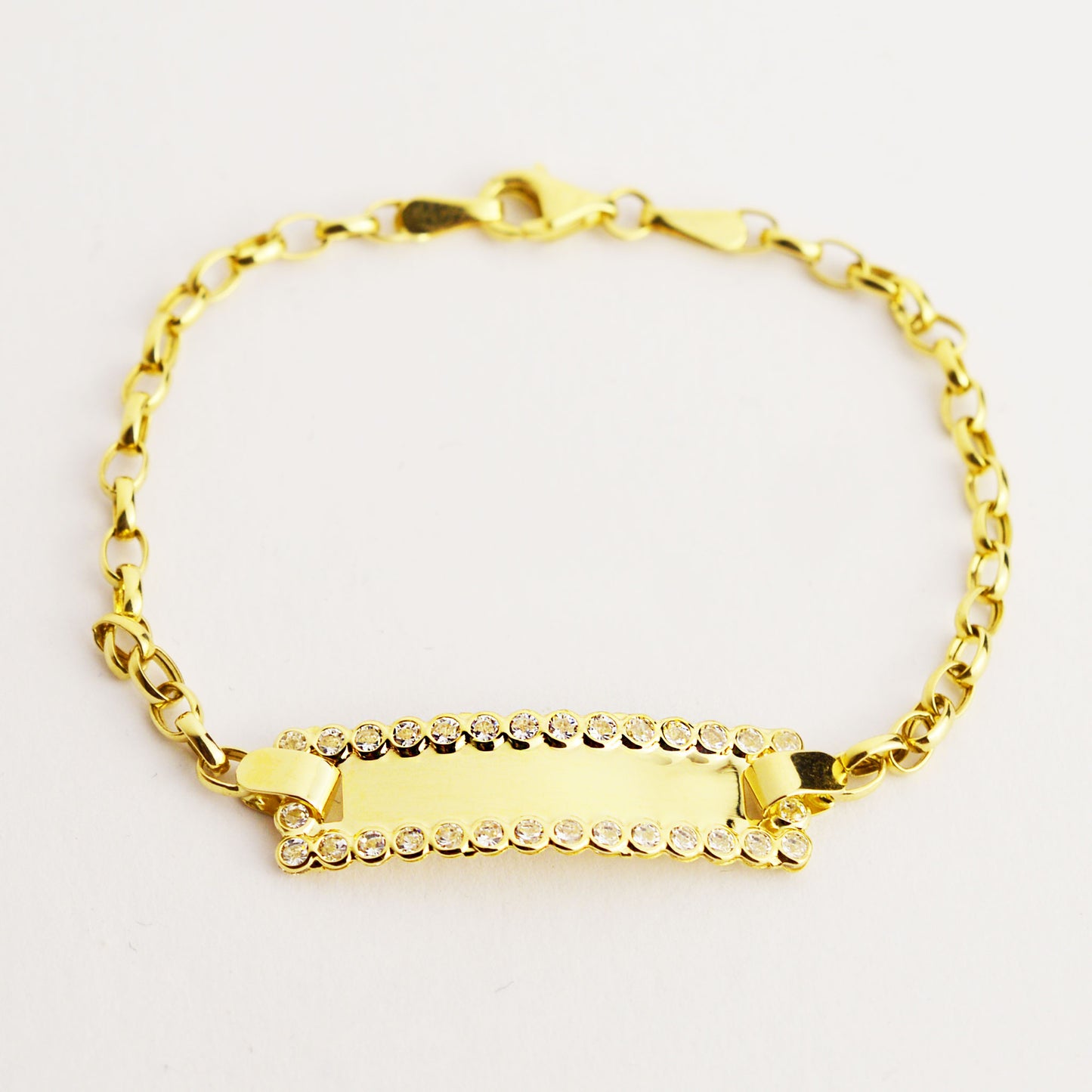 Gold children's bracelet with zirconium