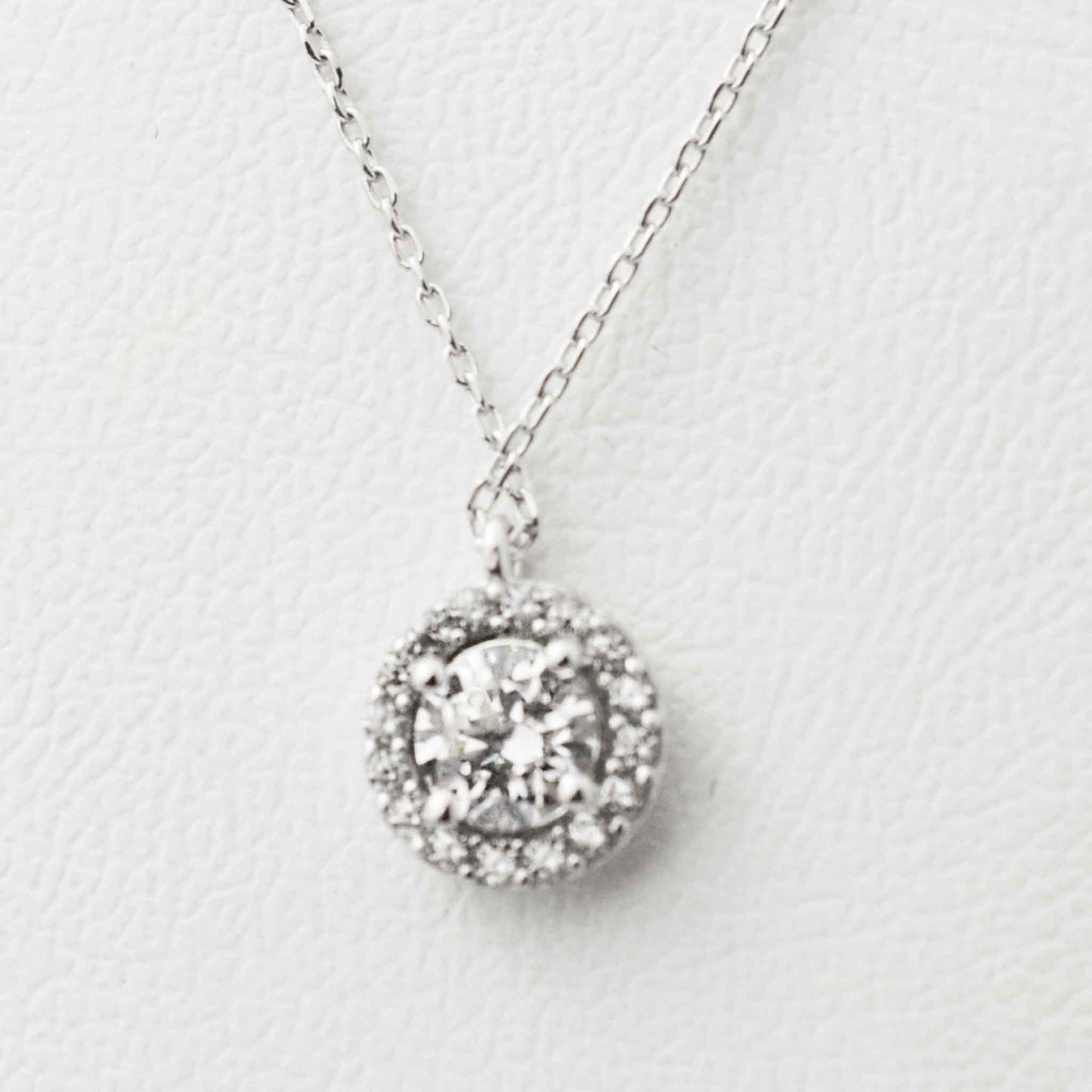 Gold necklace with white gold pendant
