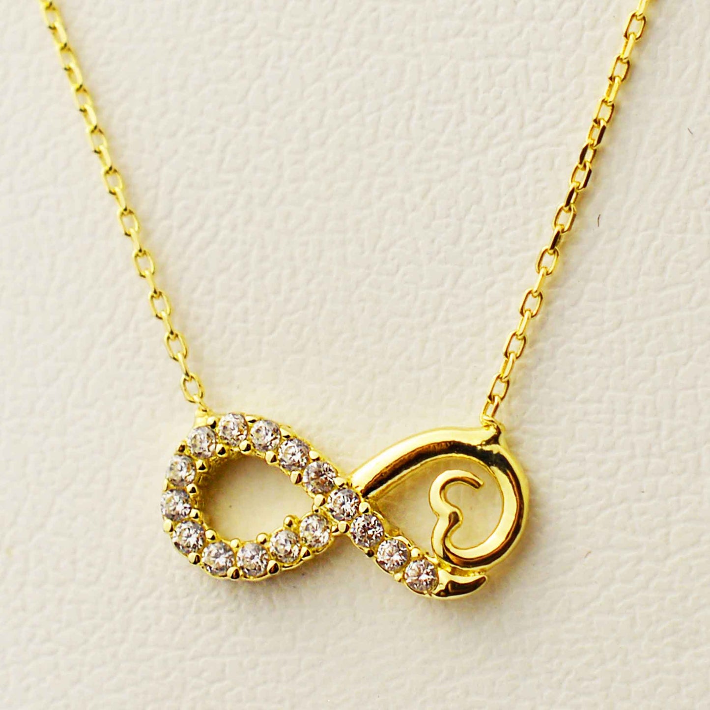 Gold necklace with Infinity pendant