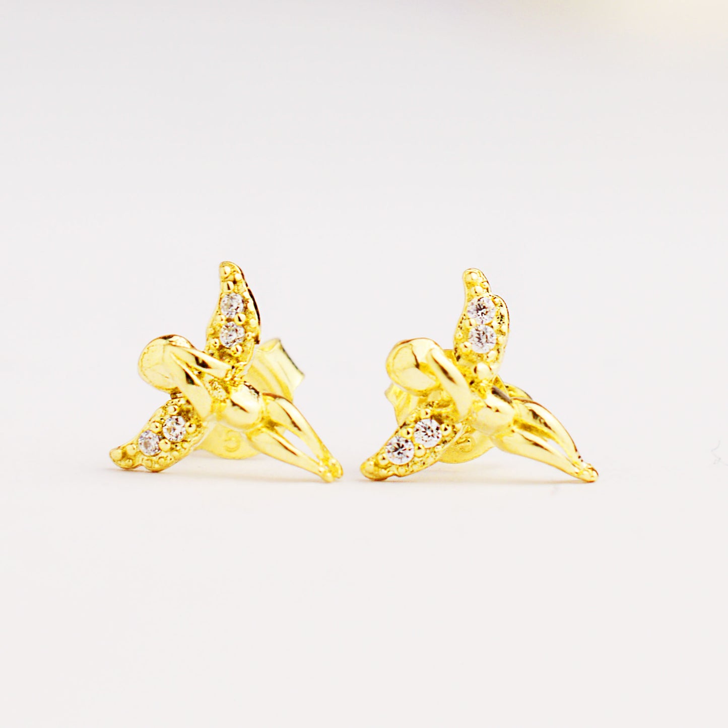 Gold women's earrings with screw Angel