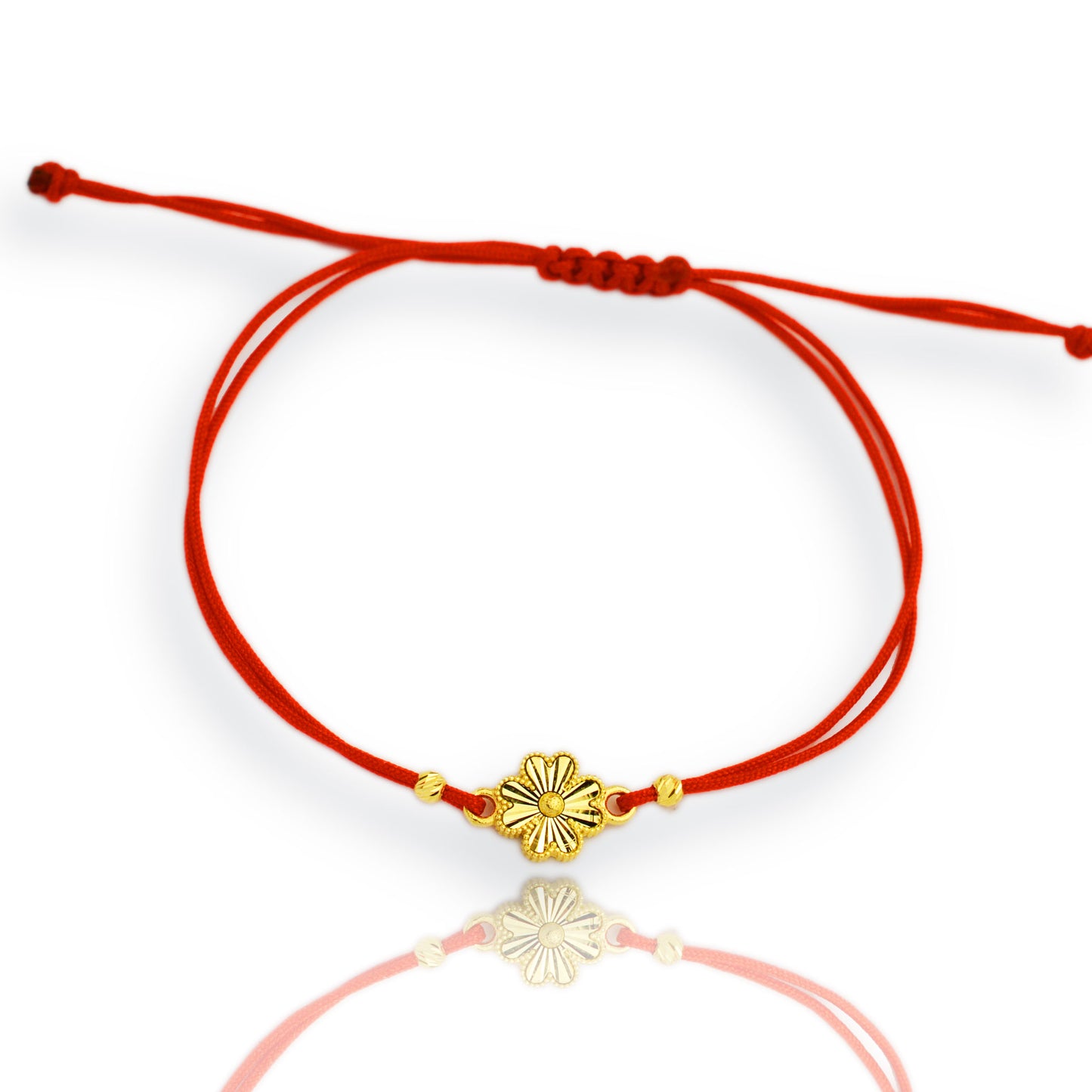 Gold on a red thread