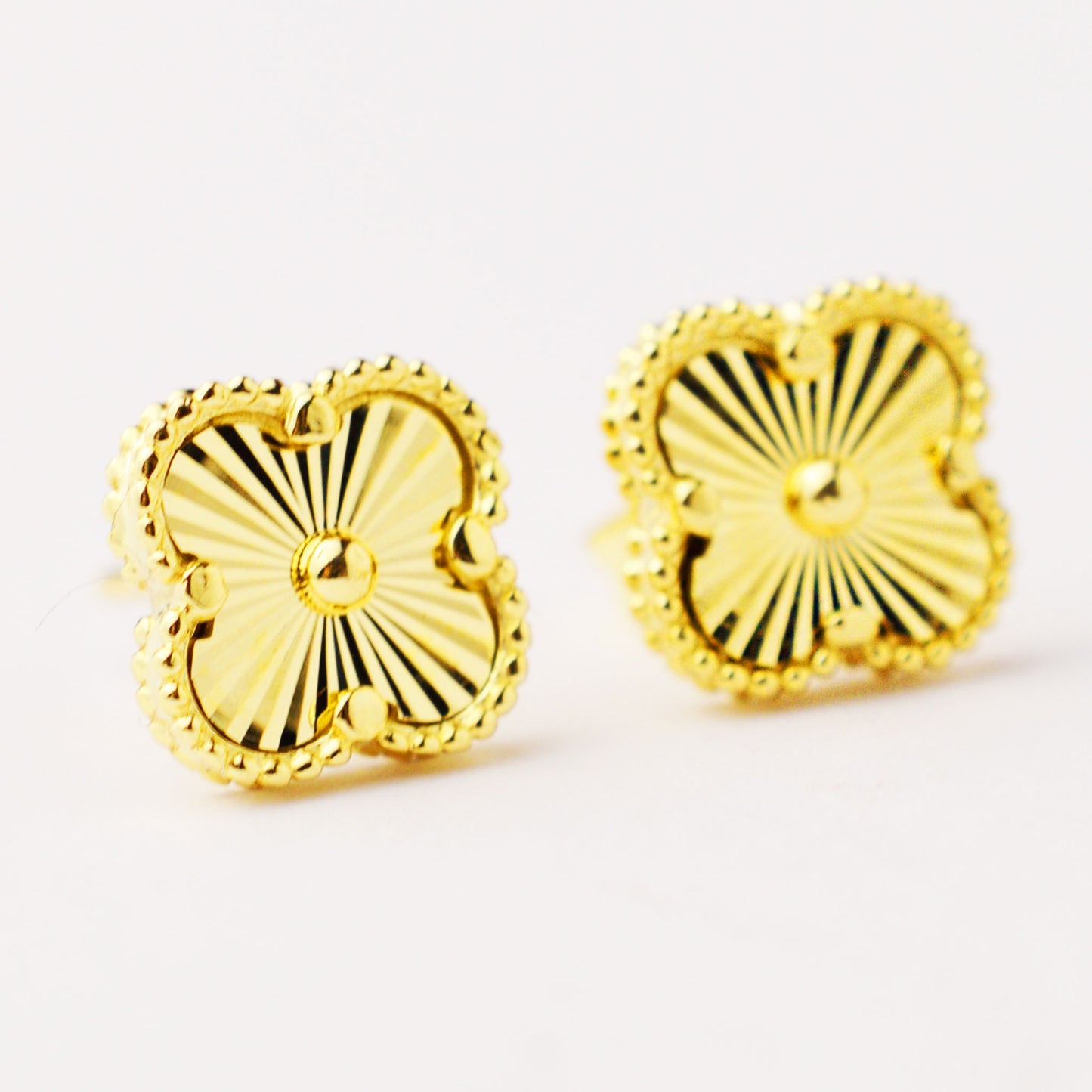 Gold Van Cleef screw earrings