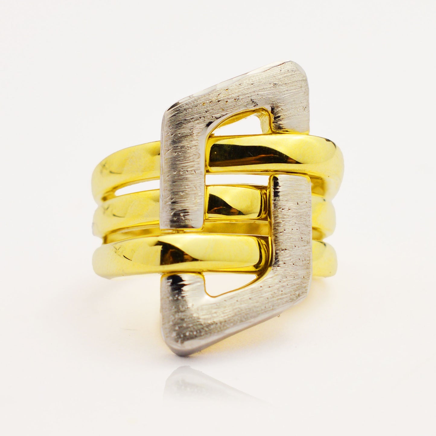 Gold finger ring made of white and yellow gold