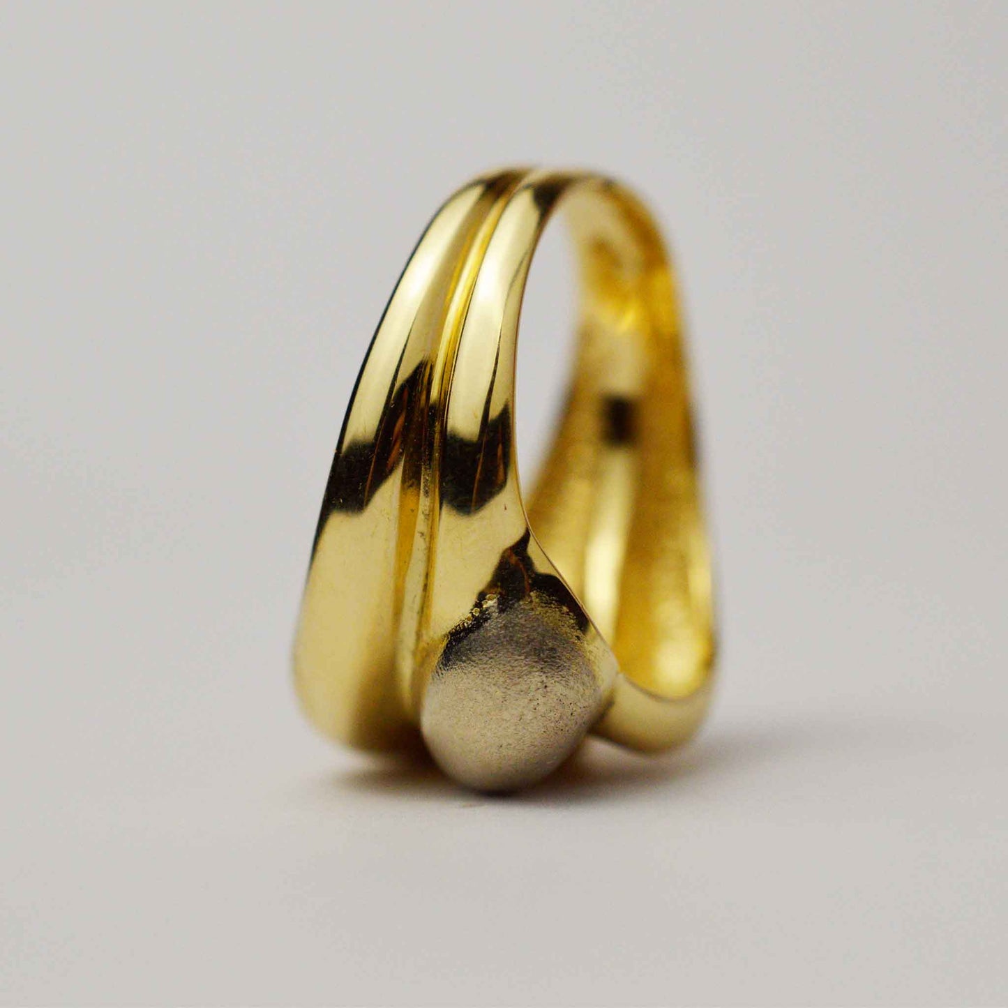Massive Bulgarian Ring made of white and yellow gold