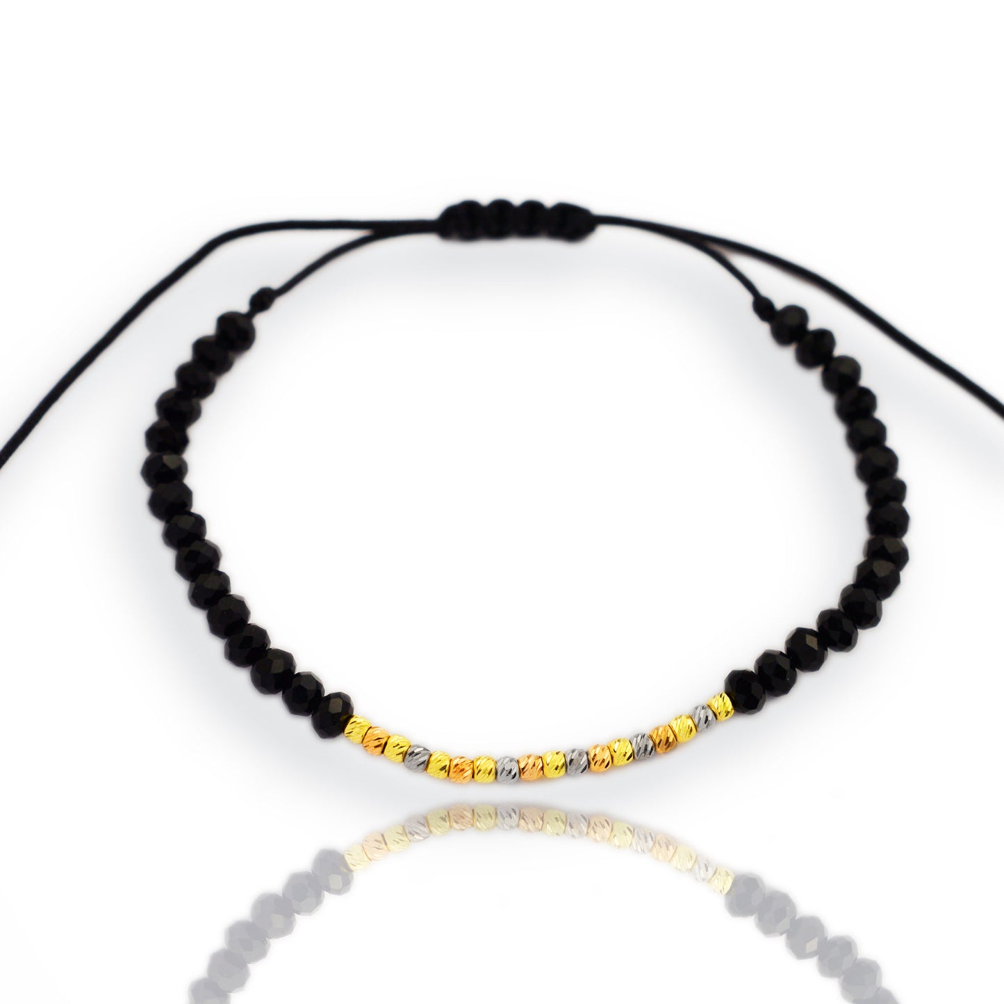 Gold on black thread with white, yellow and rose gold