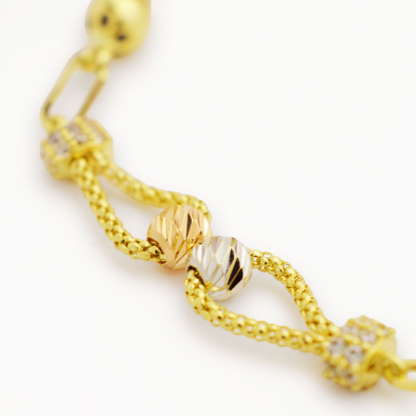 Златна гривна от бяло, розово и жълто злато