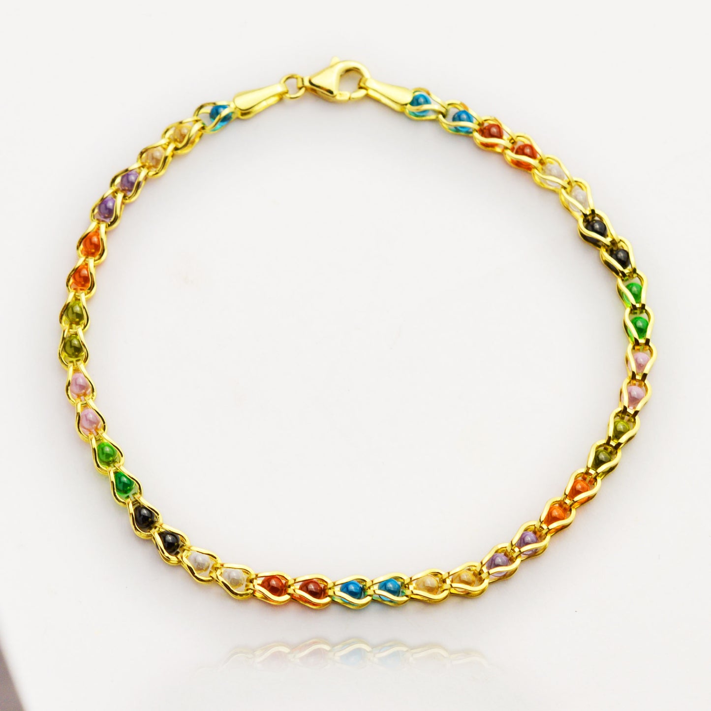 Gold bracelet with a mix of natural stones