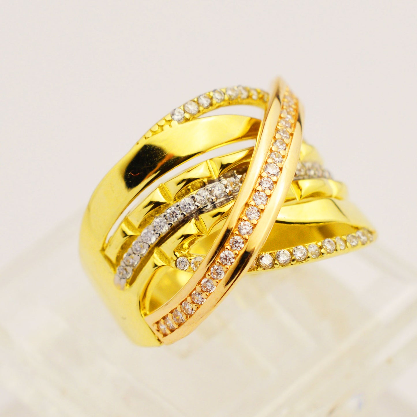 Gold ring made of white, yellow and rose gold