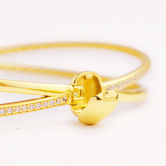 Златна твърда гривна