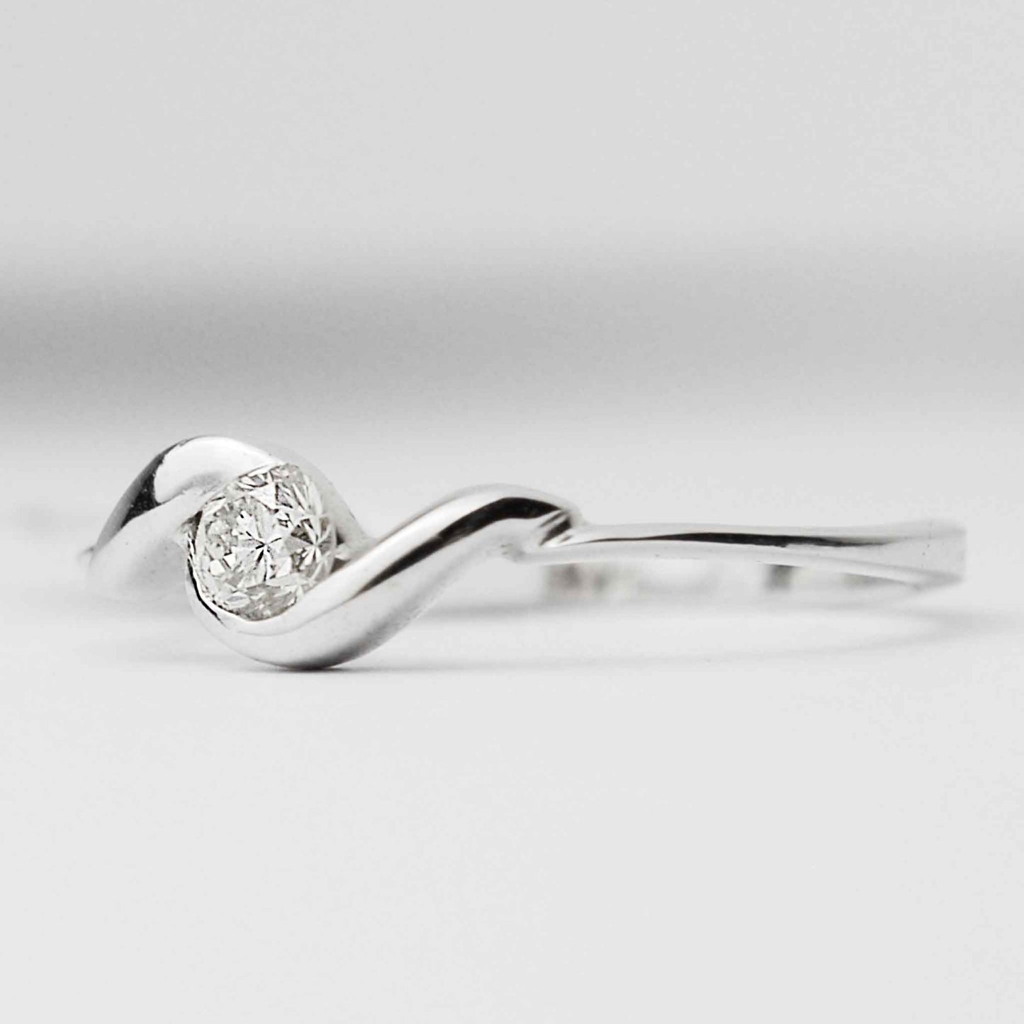 White gold ring with diamond