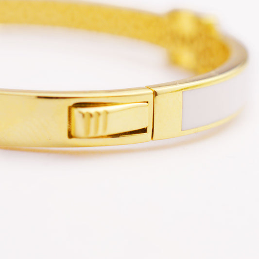 Златна твърда гривна - Hermes