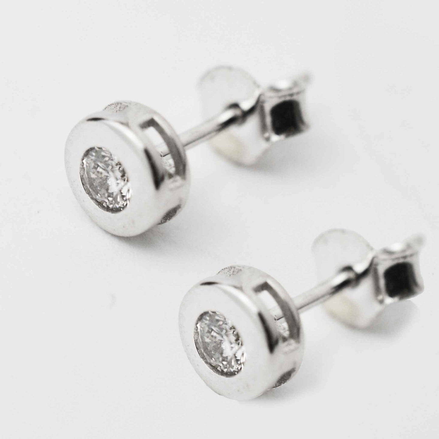 White gold screw earrings