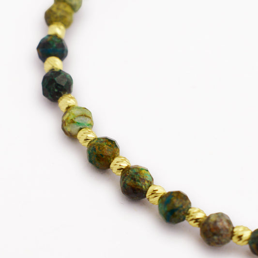 Златно на конец с африкански тюркоаз