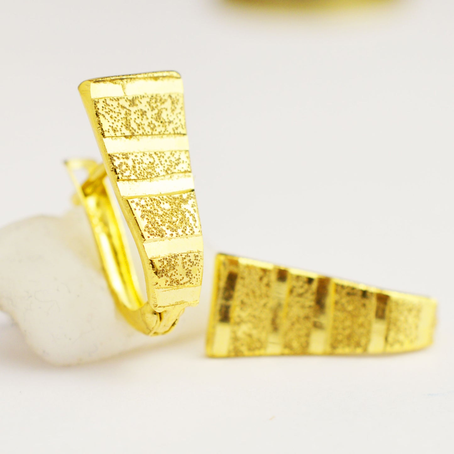 Women's gold earrings