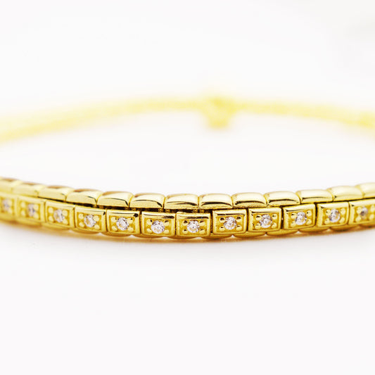 Еластична златна гривна