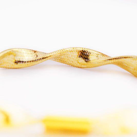 Златна еластична гривна