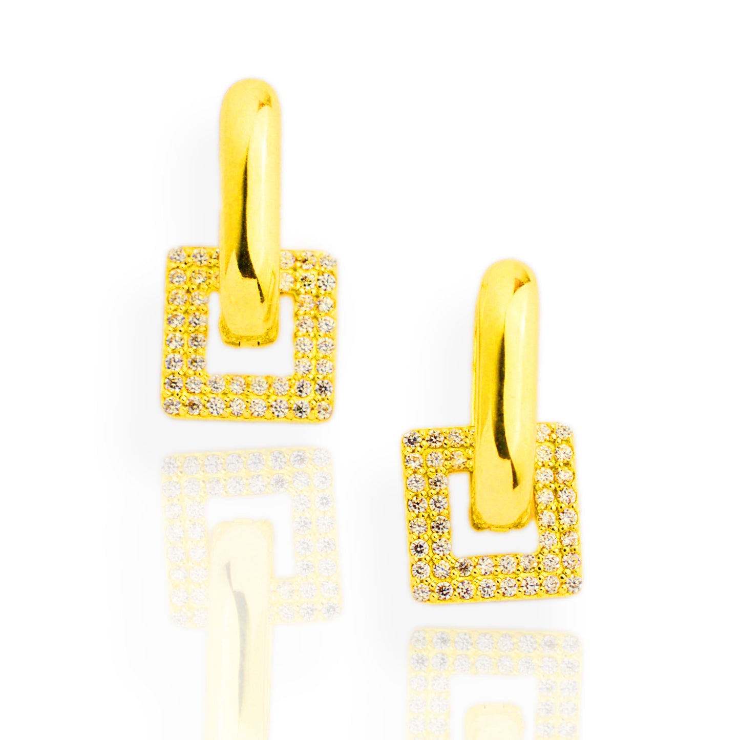 Gold earrings with a hanging element