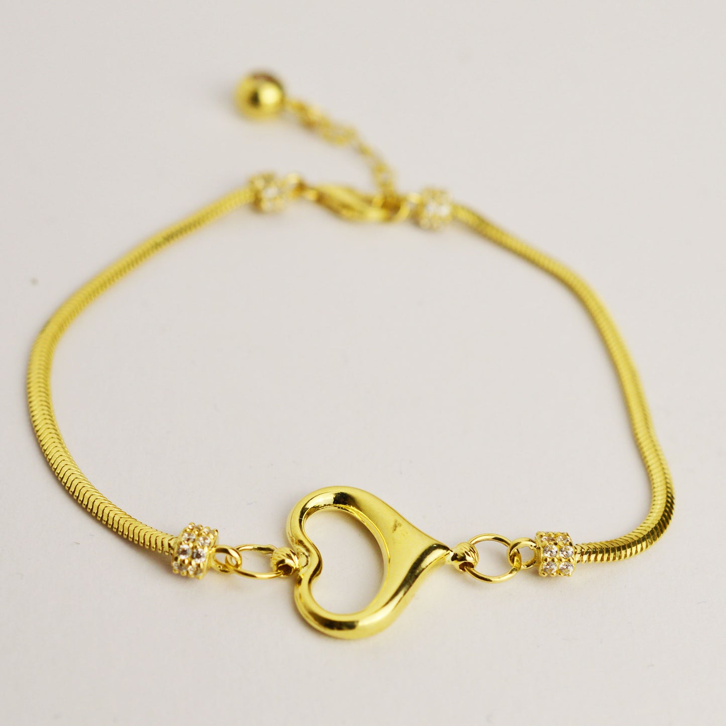 Gold bracelet with heart - tondo