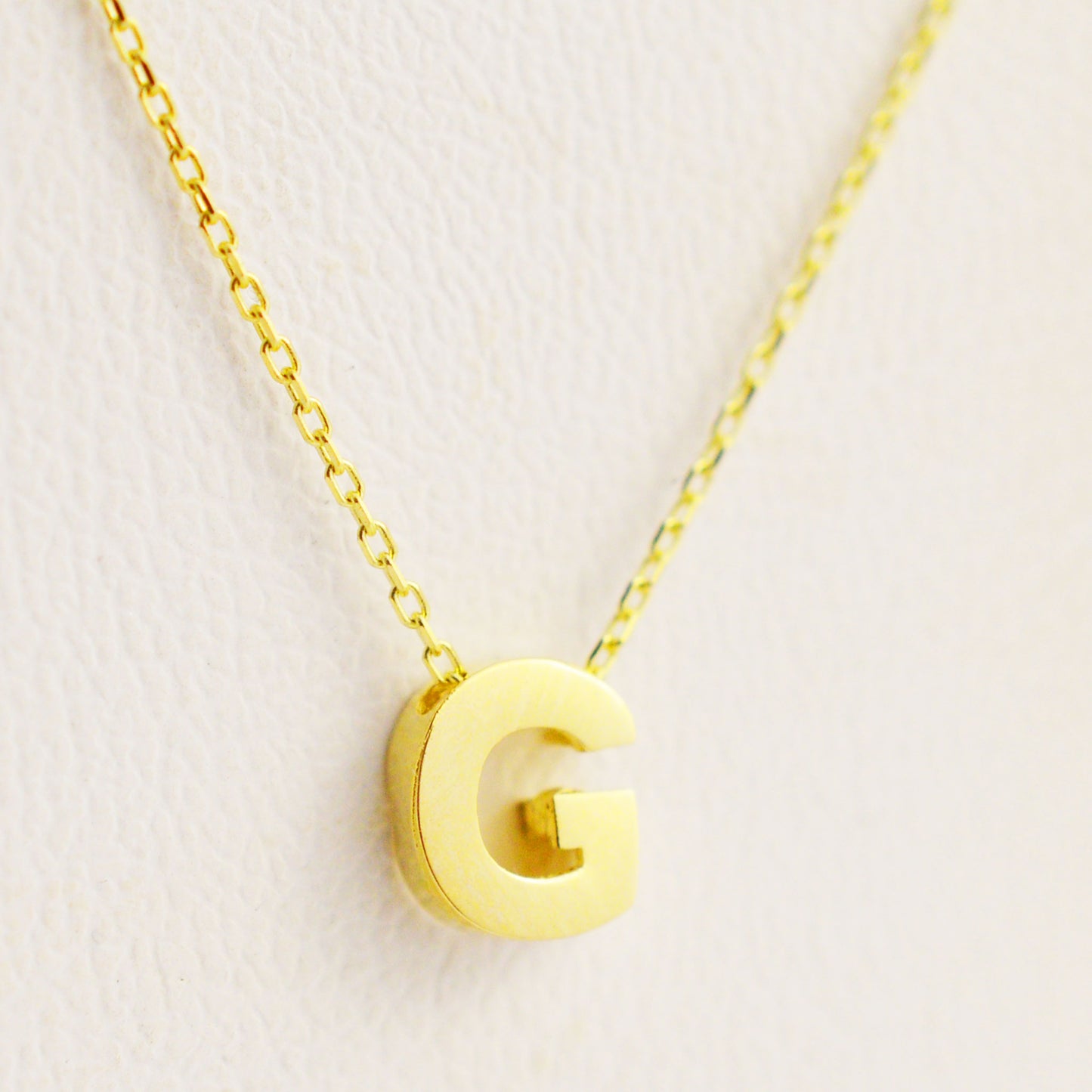 Gold necklace - letter 'G'