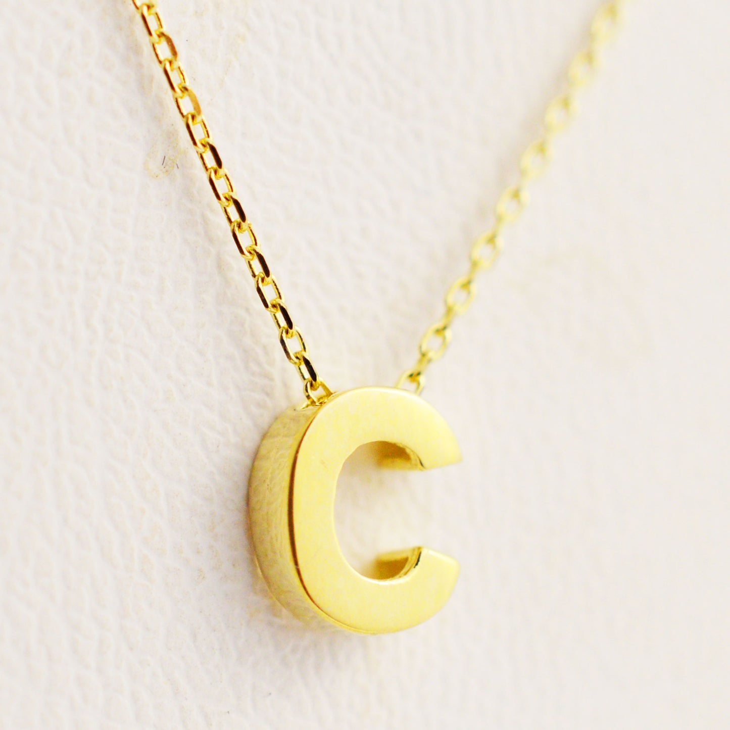 Gold necklace - letter 'C'