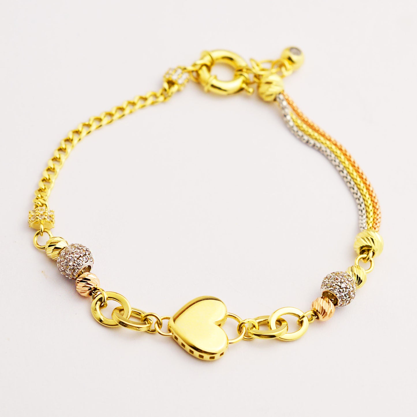 Women's gold bracelet made of white, rose and yellow gold