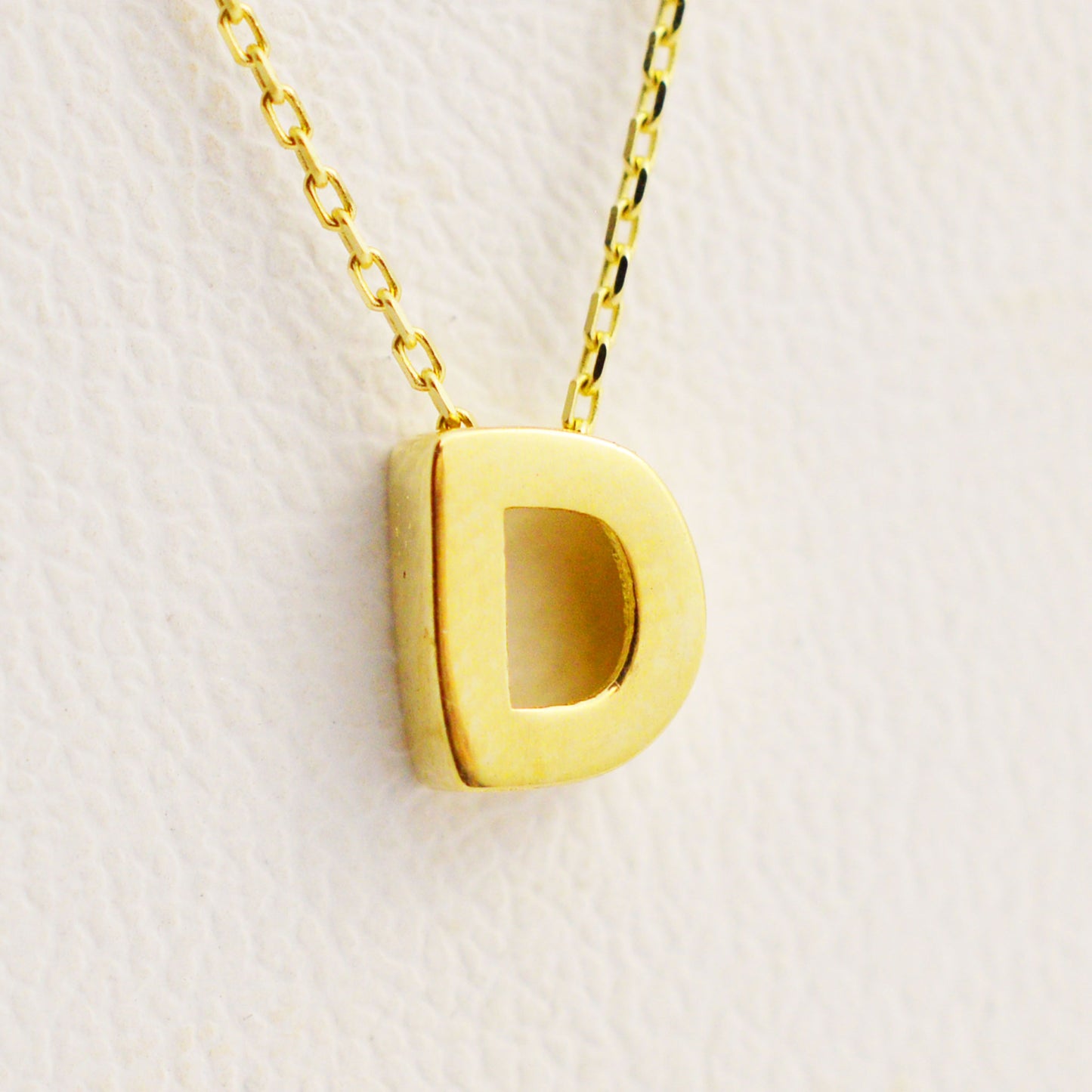Gold necklace - letter 'D'