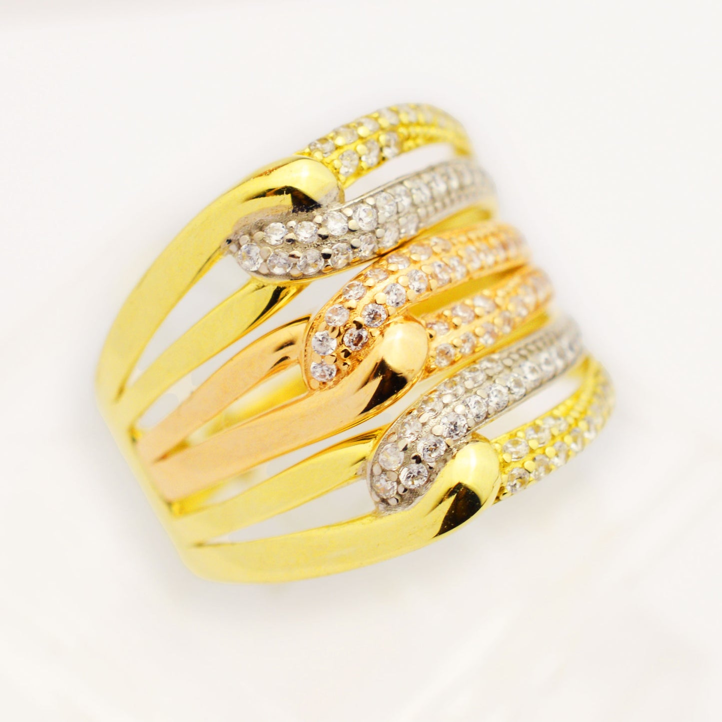 Gold ring made of white, yellow and rose gold