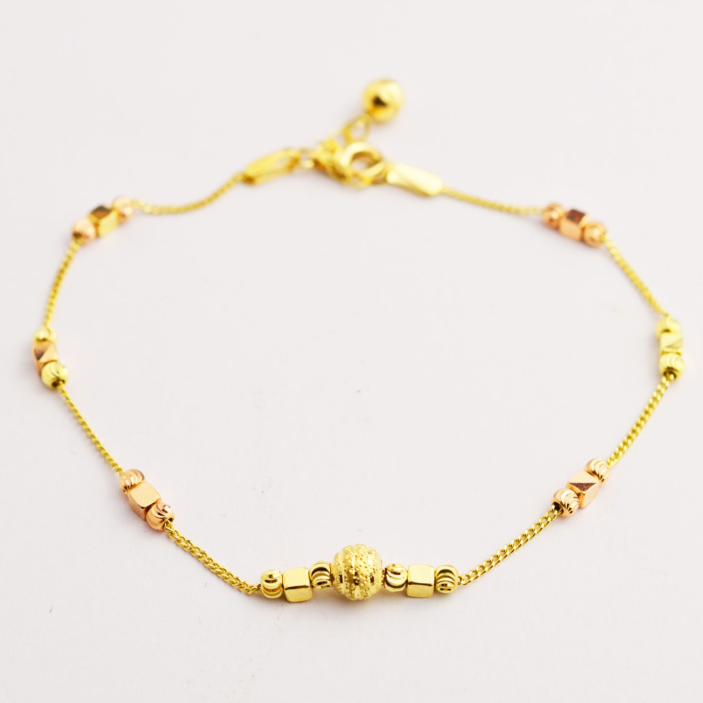 Women's gold bracelet made of white, rose and yellow gold