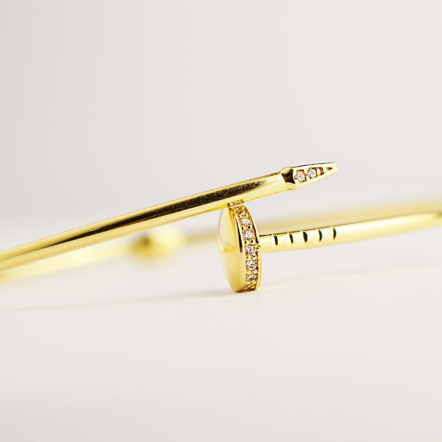 Gold solid nail bracelet