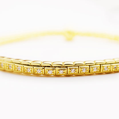 Еластична златна гривна