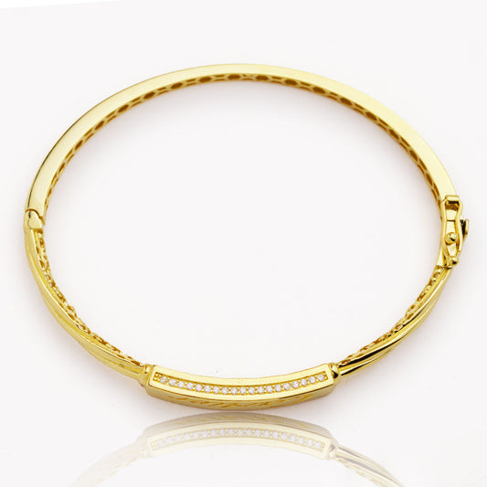 Златна твърда гривна Cartier