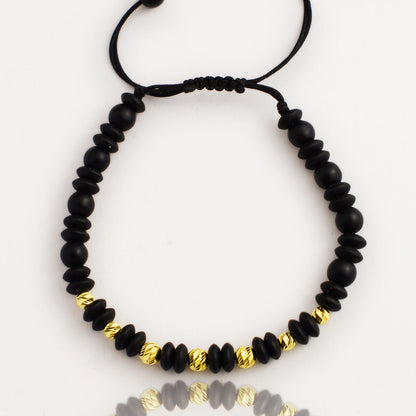 Злато на черен конец с оникс