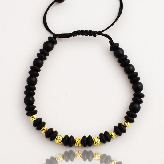 Злато на черен конец с оникс