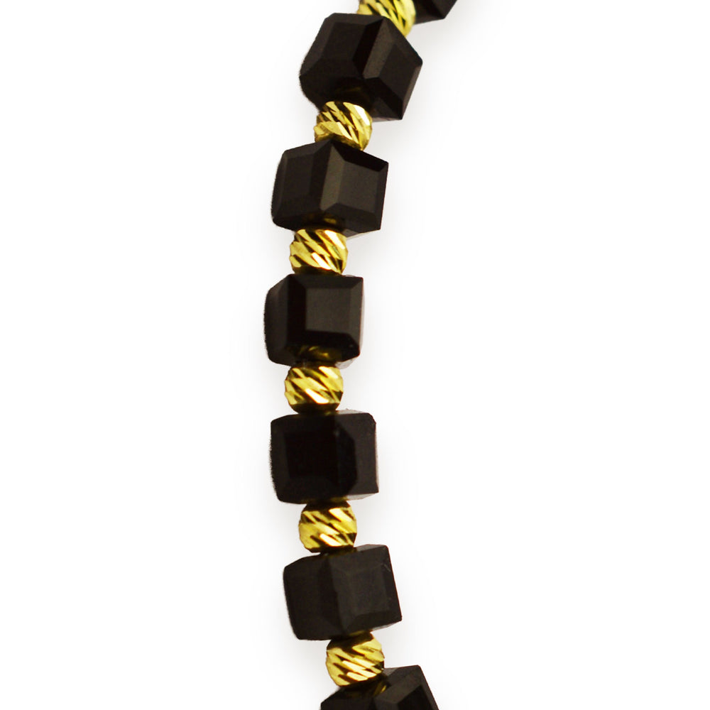 Gold on black thread with onyx